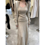 In The Autumn Of 2025, The New Women's Long-Sleeved Knitted Cardigan Is Hoisted With A High-Rise Half-Body Skirt.